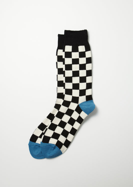 Rototo Checkerboard Crew Socks in black and ivory checks with light blue in the heel and toe